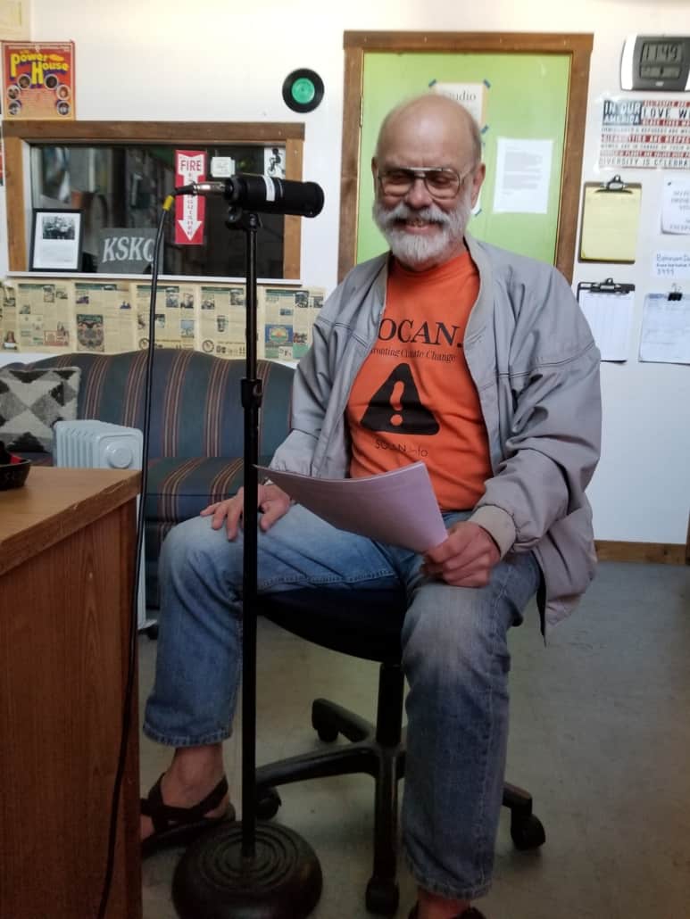 founder of SOCAN behind a radio microphone
