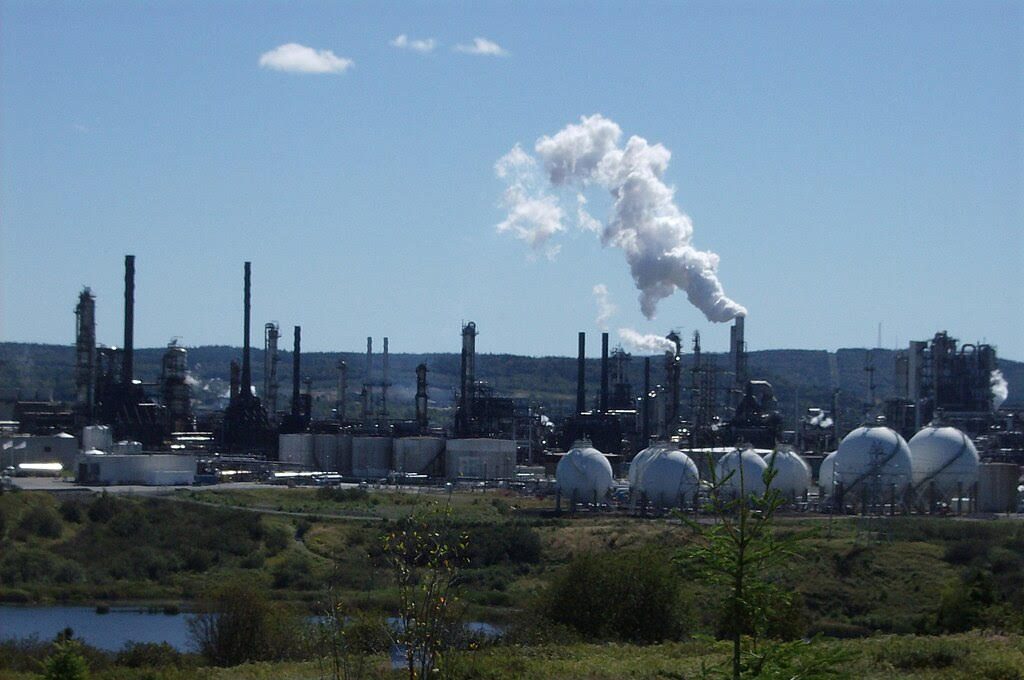 industrial park emitting gasses into the atmosphere
